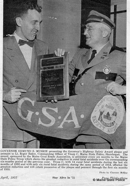 April 1955- Gov. Edmund Muskie presents Troop C Commander Lt. Roger Baker with Governors Safety Award