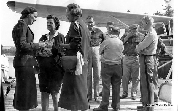 Late 50s-Early 60s, United Nations delegation visits Moosehead Lake in Maine. Senator Edmund Muskie, Capt. Millard Nickerson, unidentified Maine Wardens.