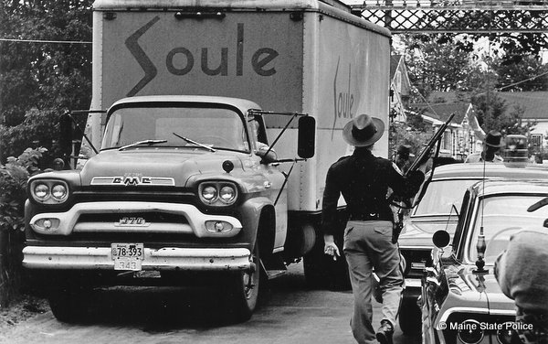 1964- Police roadblock in Maine, searching for the shooter of Maine State Police officer Charles Black