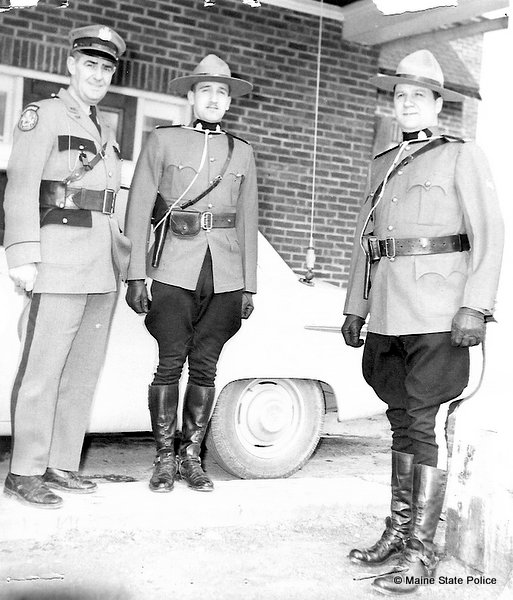 Maine State Trooper Otis Labree wtih two Royal Canadian Mounted Police (RCMP)